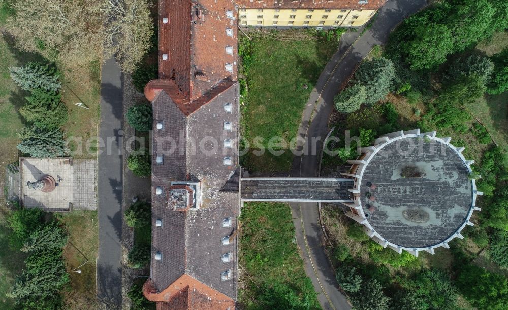 Vertical aerial photograph Wünsdorf - Vertical aerial view from the satellite perspective of the building complex of the former military barracks House of Officers in the district Waldstadt in Wuensdorf in the state Brandenburg, Germany. During the GDR era, the area served as the high command of the Russian - Soviet - allied occupation forces