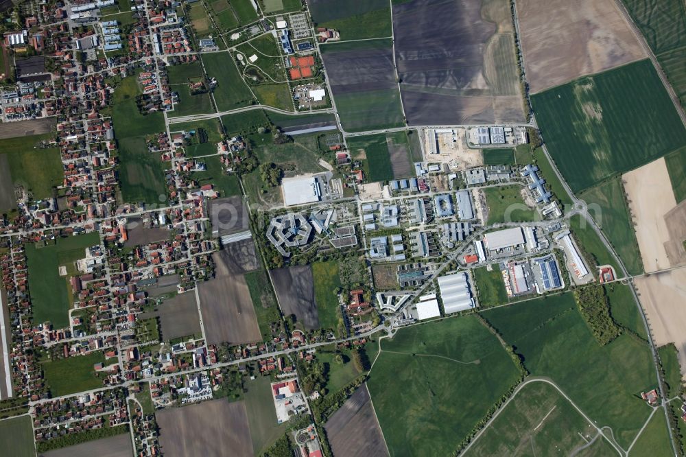 Vertical aerial photograph Hallbergmoos - Vertical aerial view from the satellite perspective of the Industrial estate and company settlement Nord-West 3 along the Ludwigstrasse in Hallbergmoos in the state Bavaria