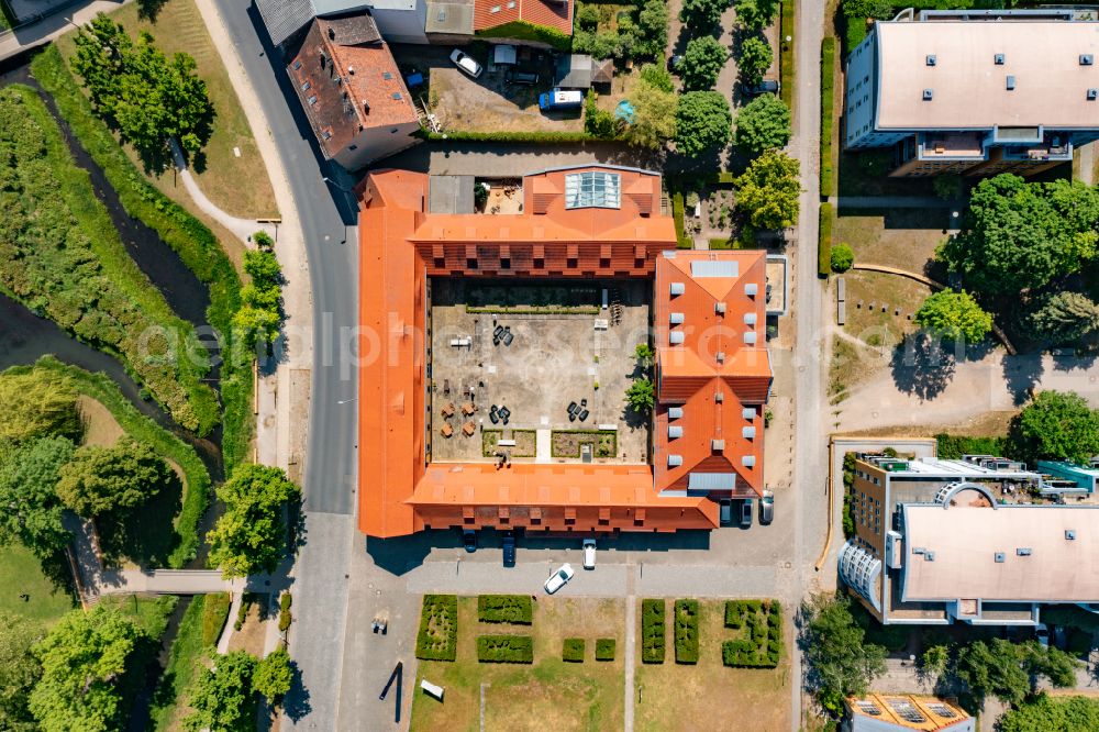 Vertical aerial photograph Luckenwalde - Vertical aerial view from the satellite perspective of the complex of the hotel building Vierseitenhof in Luckenwalde in the state Brandenburg, Germany