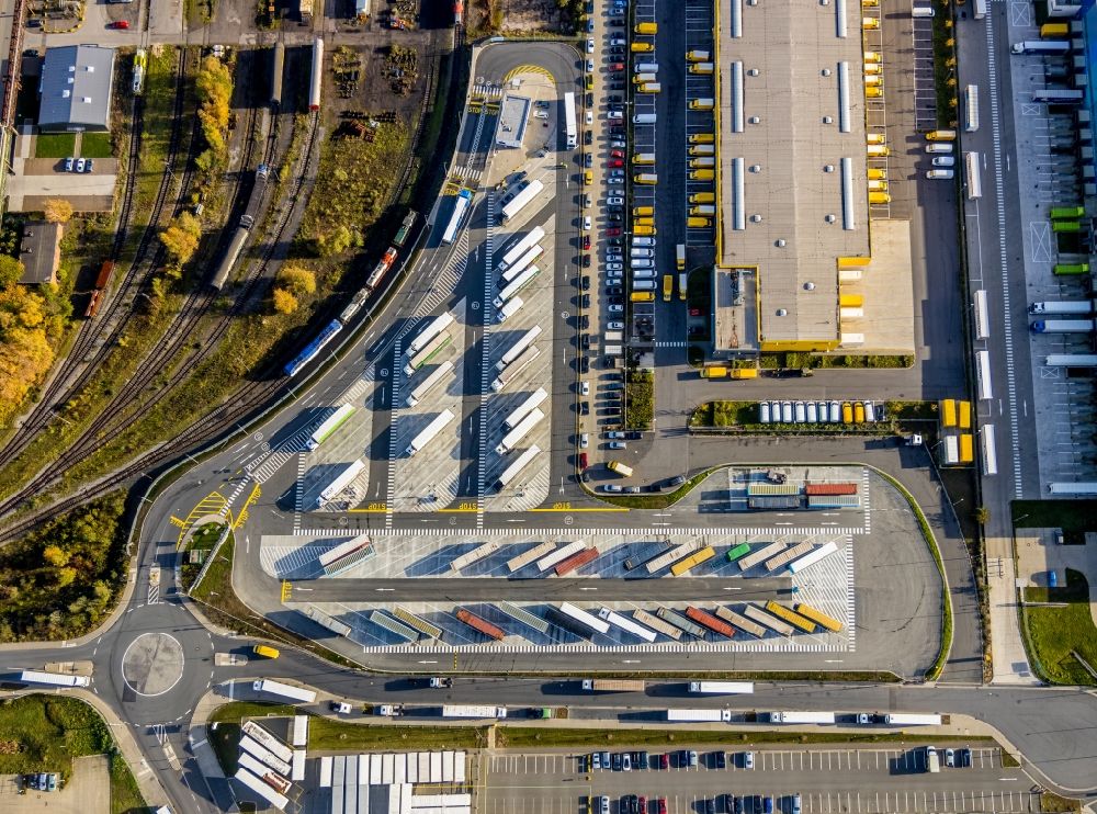 Vertical aerial photograph Dortmund - Vertical aerial view from the satellite perspective of the lorries and Truck storage areas and free-standing storage on grounds of logistic center Amazon in the district Westfalenhuette in Dortmund in the state North Rhine-Westphalia, Germany
