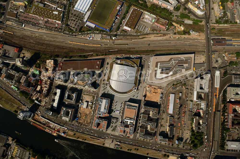 Vertical aerial photograph Berlin - Vertical aerial view from the satellite perspective of the arena Mercedes-Benz-Arena on Friedrichshain part of Berlin. The former O2 World - now Mercedes-Benz-Arena - is located in the Anschutz Areal, a business and office space on the riverbank