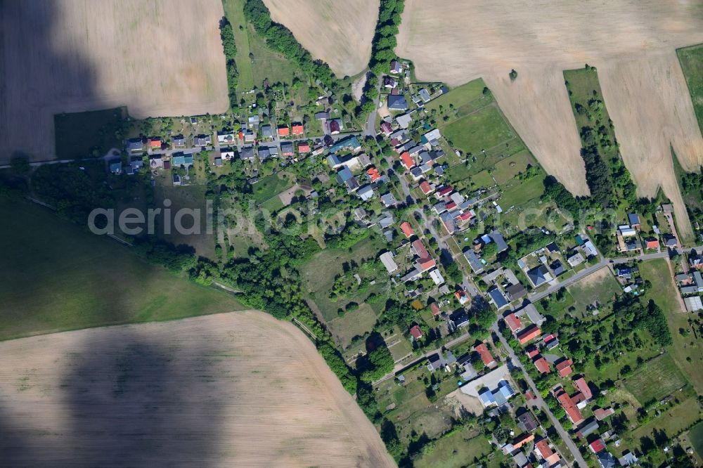 Vertical aerial photograph Werbellin - Vertical aerial view from the satellite perspective of the village view on the edge of agricultural fields and land in Werbellin in the state Brandenburg, Germany
