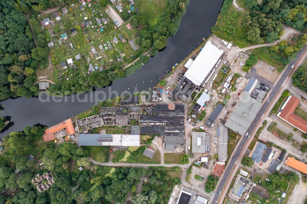 Vertical aerial photograph Eberswalde - Vertical aerial view from the satellite perspective of the ruin the buildings and halls Papierfabrik Wolfswinkel in Eberswalde in the state Brandenburg, Germany