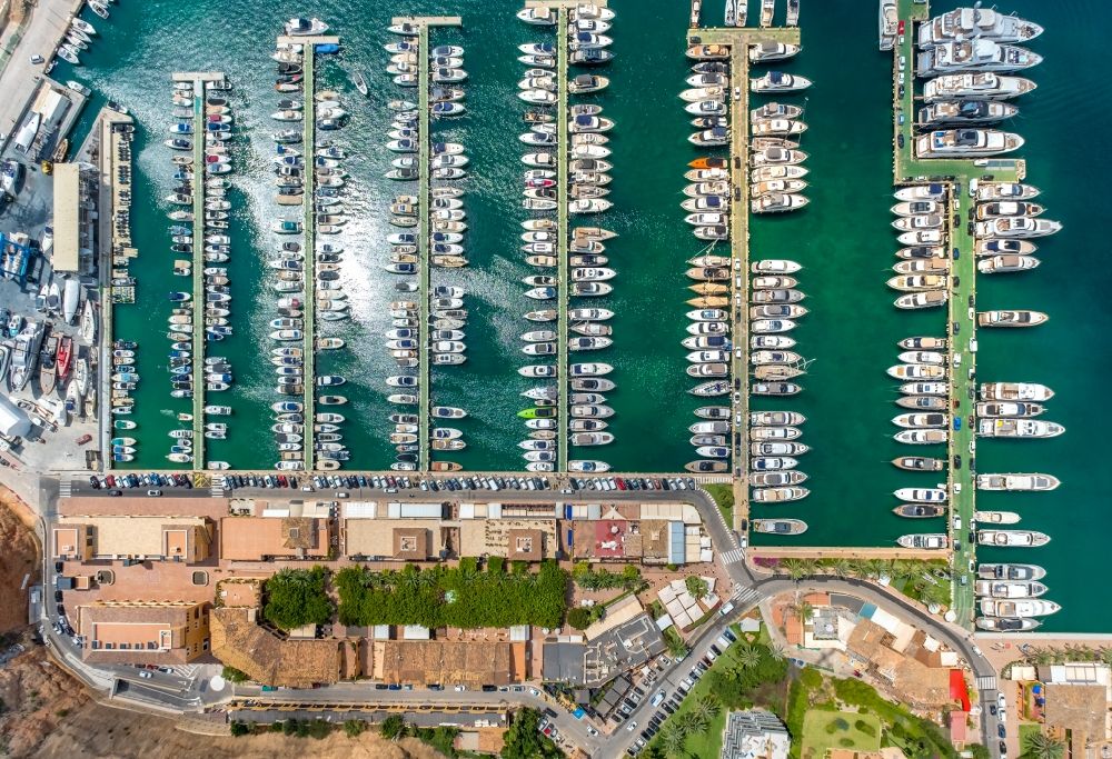 Vertical aerial photograph Portals Nous - Vertical aerial view from the satellite perspective of the pleasure boat marina with docks and moorings on the shore area Puerto Portals in Portals Nous in Balearic island of Mallorca, Spain