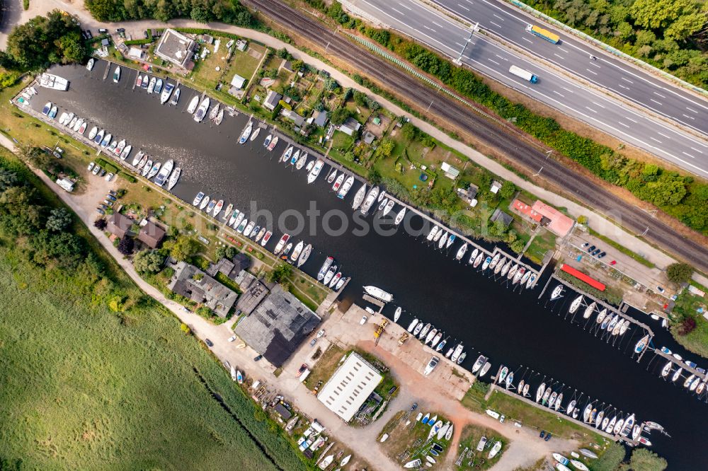 Vertical aerial photograph Bad Schwartau - Vertical aerial view from the satellite perspective of the pleasure boat marina with docks and moorings on the shore area of Trave in Bad Schwartau in the state Schleswig-Holstein, Germany